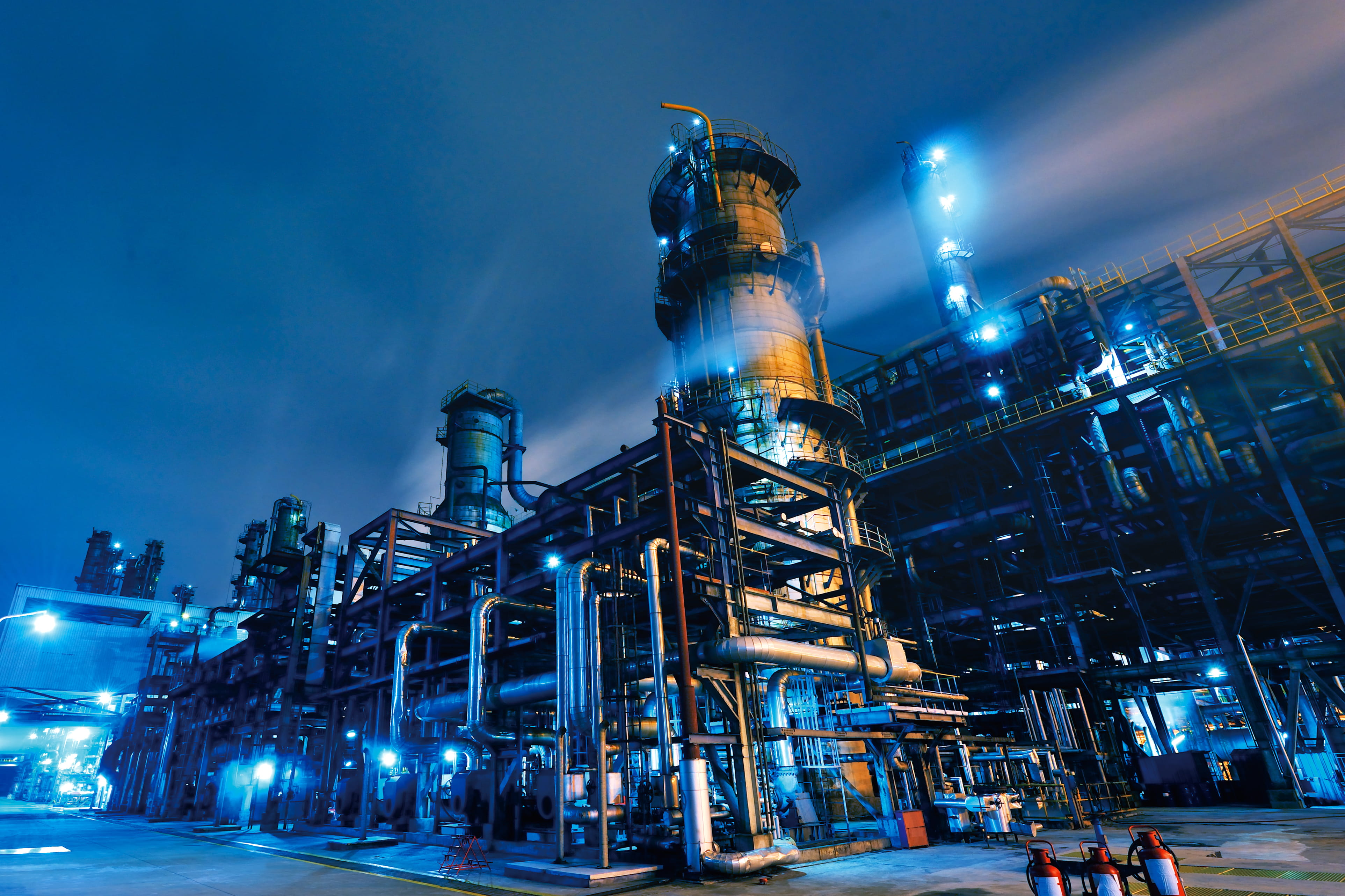 oil refinery at night