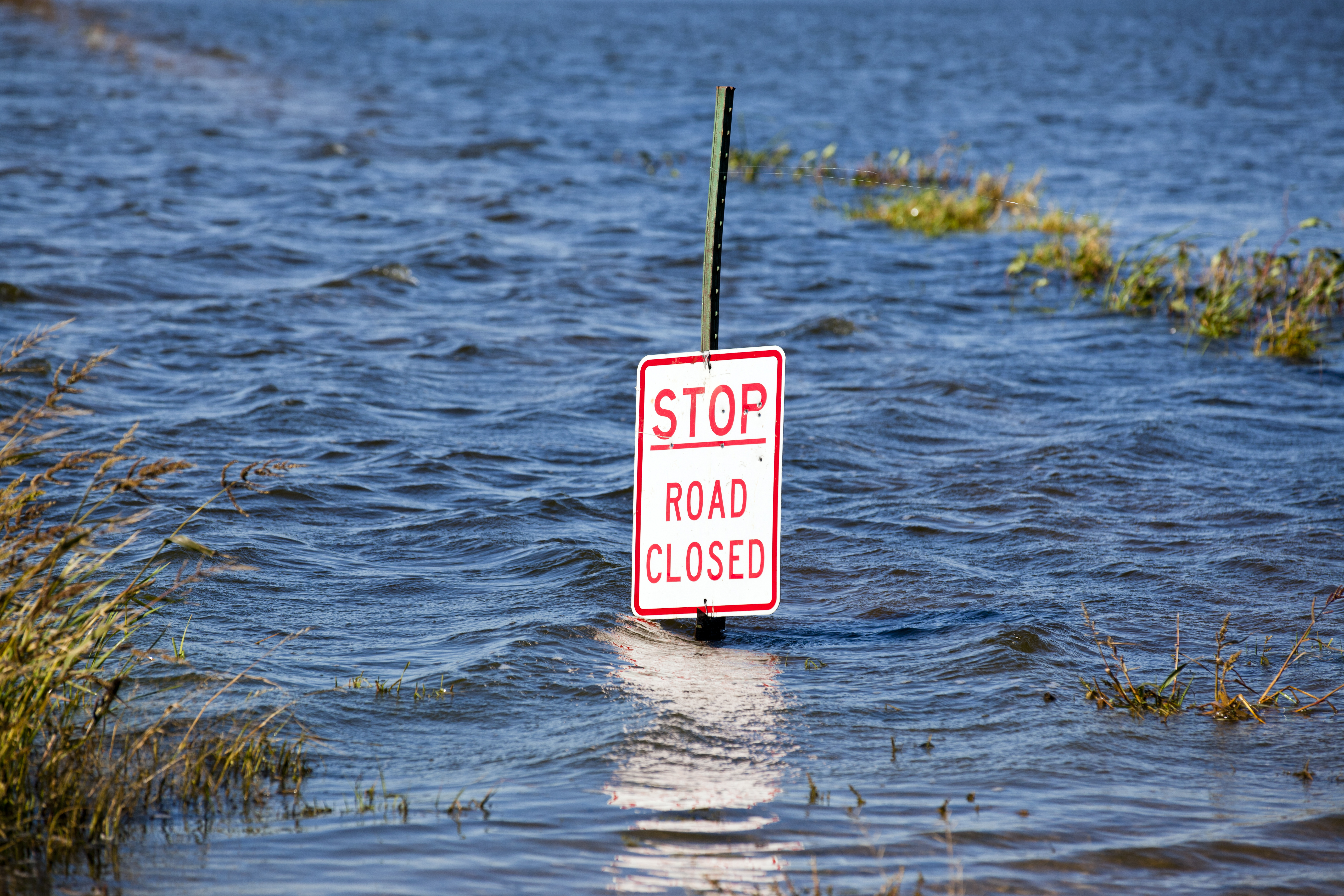 high water, road closed sign